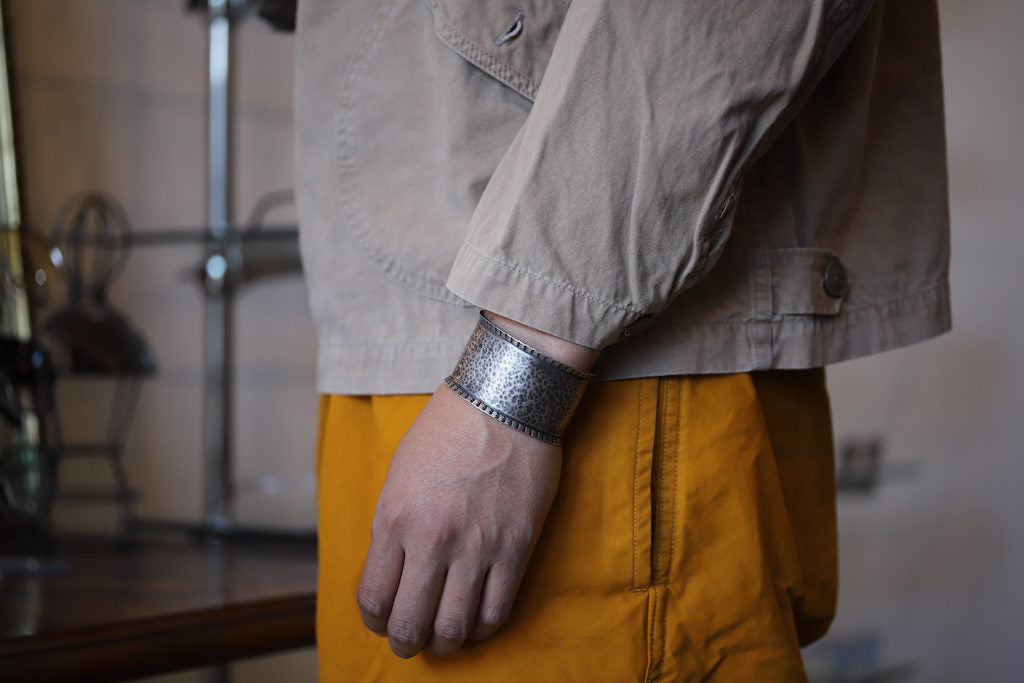 JAMES FAKS STAMP BANGLE BLACK FOOT