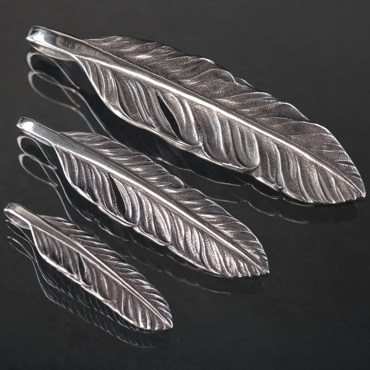 LYNCH SILVER SMITH FEATHER(L)